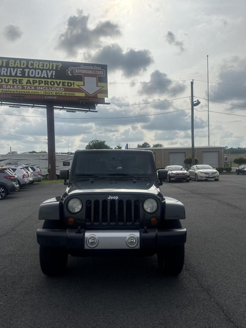 2010 Green Jeep Wrangler (1J4AA5D17AL) with an V6, 3.8 Liter engine, Automatic, 4-Spd w/Overdrive transmission, located at 8008 Warden Rd, Sherwood, AR, 72120, (501) 801-6100, 34.830078, -92.186684- Photo#1