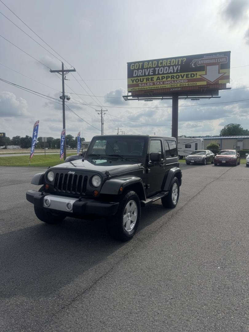 2010 Green Jeep Wrangler (1J4AA5D17AL) with an V6, 3.8 Liter engine, Automatic, 4-Spd w/Overdrive transmission, located at 8008 Warden Rd, Sherwood, AR, 72120, (501) 801-6100, 34.830078, -92.186684- Photo#2
