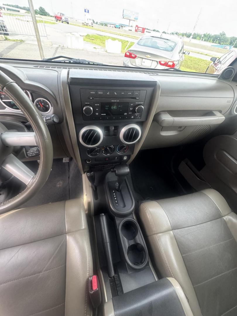2010 Green Jeep Wrangler (1J4AA5D17AL) with an V6, 3.8 Liter engine, Automatic, 4-Spd w/Overdrive transmission, located at 8008 Warden Rd, Sherwood, AR, 72120, (501) 801-6100, 34.830078, -92.186684- Photo#4