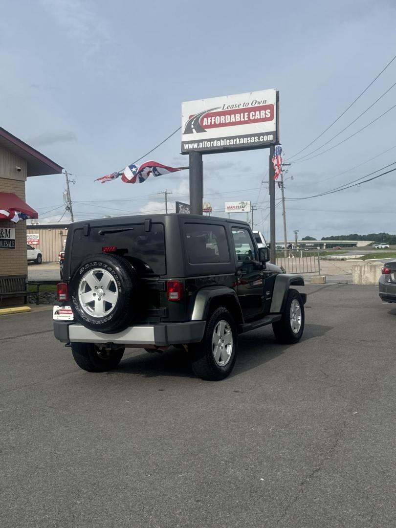 2010 Green Jeep Wrangler (1J4AA5D17AL) with an V6, 3.8 Liter engine, Automatic, 4-Spd w/Overdrive transmission, located at 8008 Warden Rd, Sherwood, AR, 72120, (501) 801-6100, 34.830078, -92.186684- Photo#7