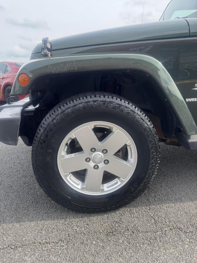2010 Green Jeep Wrangler (1J4AA5D17AL) with an V6, 3.8 Liter engine, Automatic, 4-Spd w/Overdrive transmission, located at 8008 Warden Rd, Sherwood, AR, 72120, (501) 801-6100, 34.830078, -92.186684- Photo#6