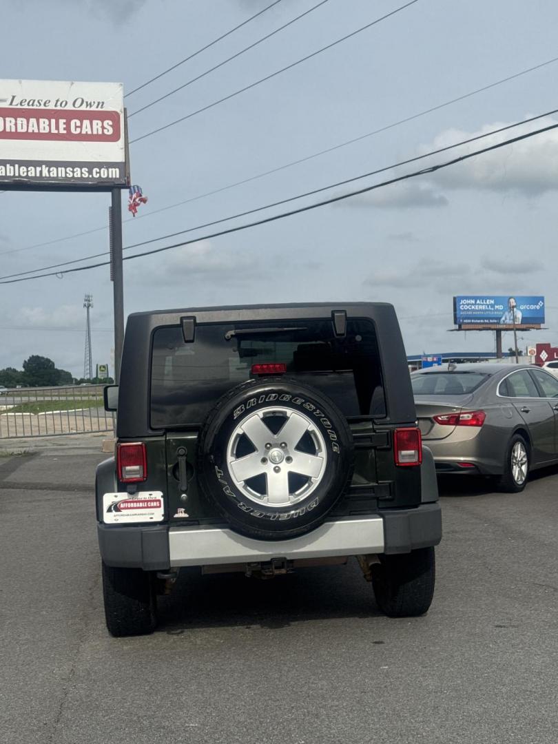 2010 Green Jeep Wrangler (1J4AA5D17AL) with an V6, 3.8 Liter engine, Automatic, 4-Spd w/Overdrive transmission, located at 8008 Warden Rd, Sherwood, AR, 72120, (501) 801-6100, 34.830078, -92.186684- Photo#8